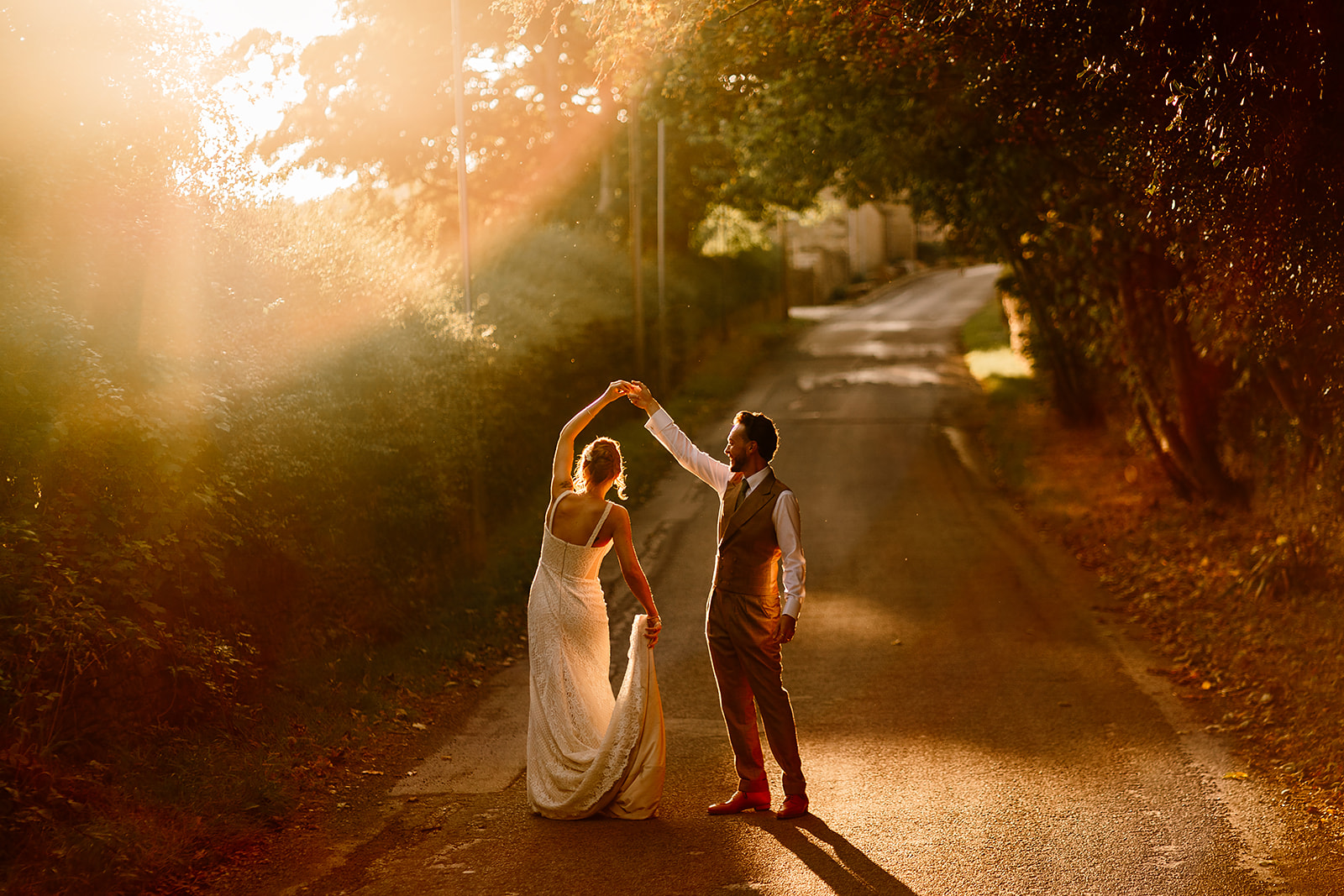 woodman inn bride & groom in sunset