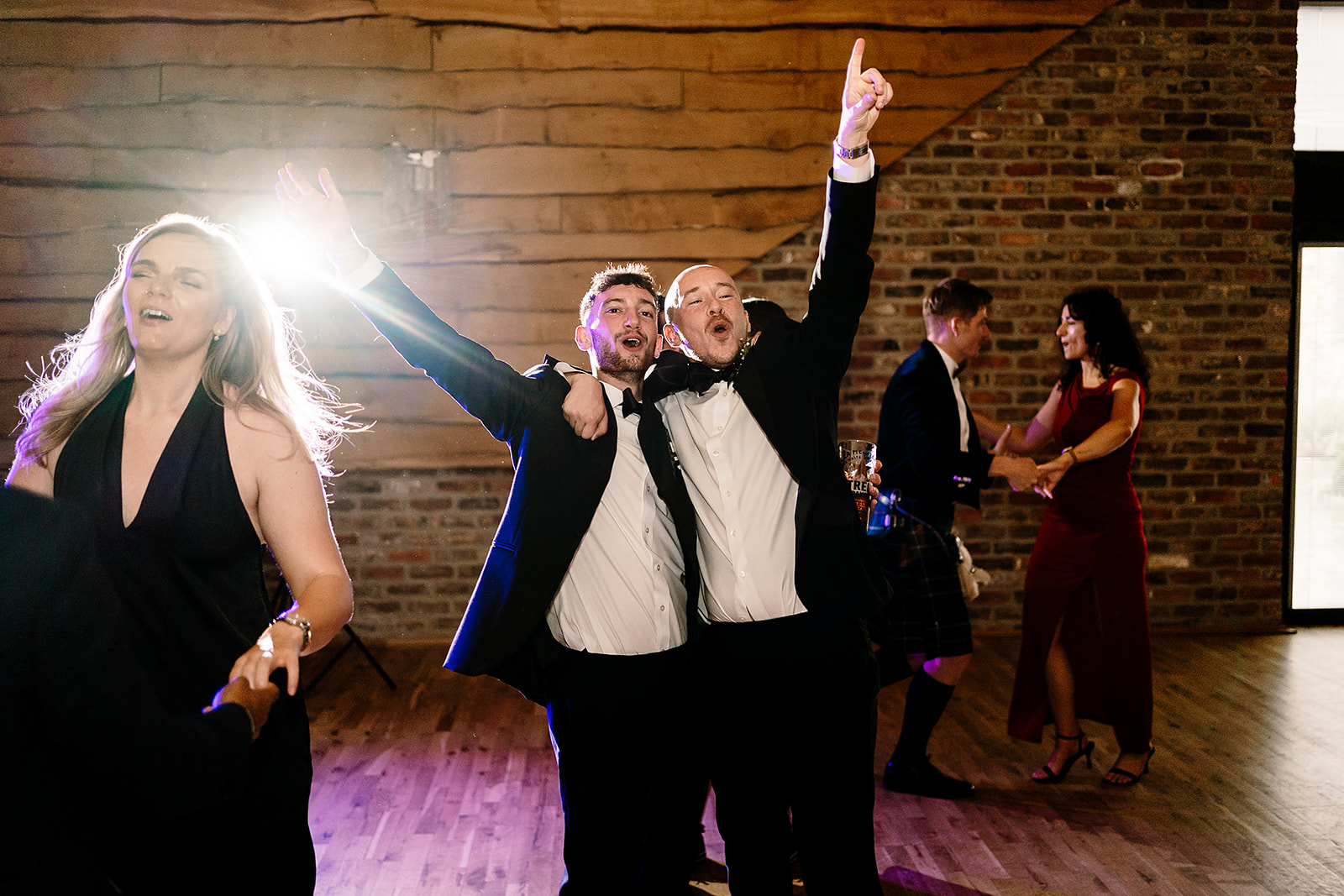 Jessica and Luke celebrating their black tie wedding at The Oakwood at Ryther, Yorkshire