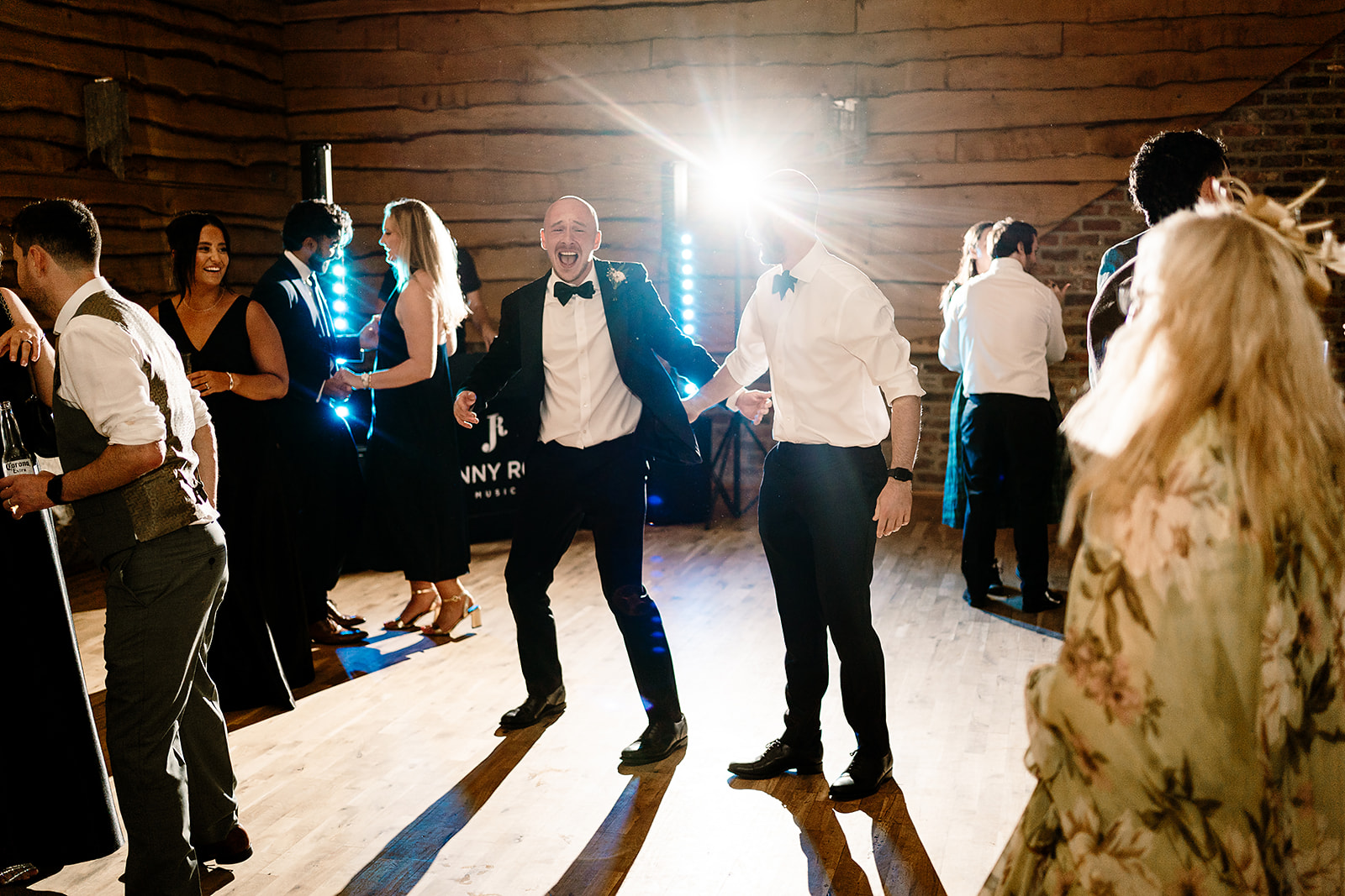 Jessica and Luke celebrating their black tie wedding at The Oakwood at Ryther, Yorkshire