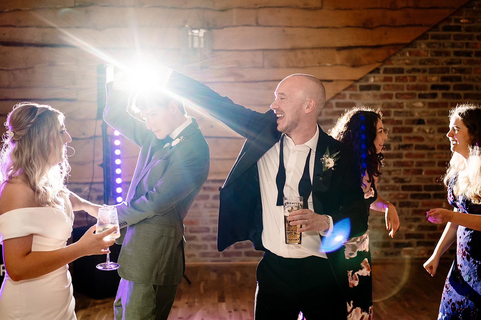 Jessica and Luke celebrating their black tie wedding at The Oakwood at Ryther, Yorkshire